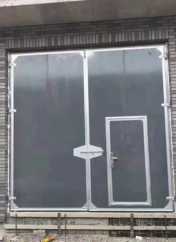 蒲城工业平开门在大型设备制造车间的应用实例